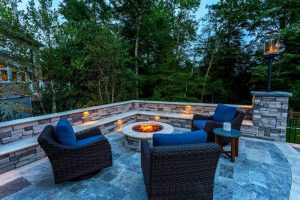 Seating Area and firepit by Ashton Pools by Design