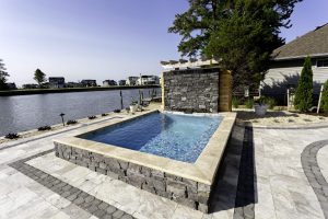Plunge pool with waterfall feature