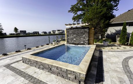 Plunge pool with waterfall feature