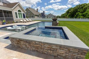 Geometric Pool and Spa with Tanning Ledge