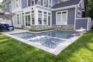 Tile inset spa and pool with waterfall