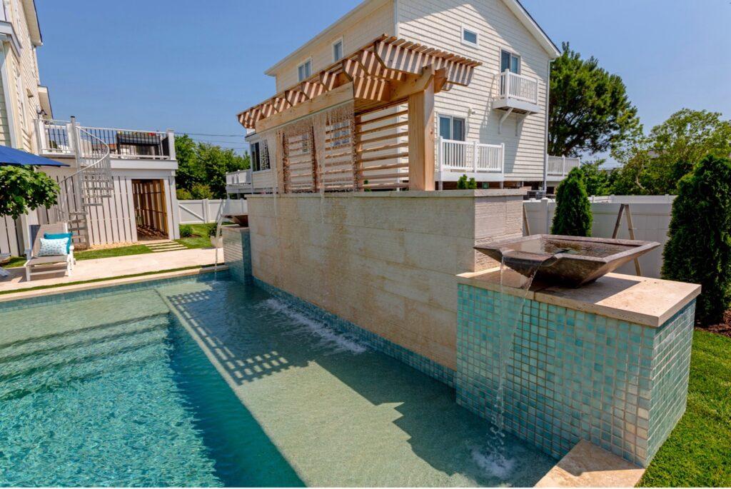 A beautiful custom water feature for a backyard oasis